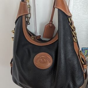 Elegant Black and Tan Leather Hobo Bag